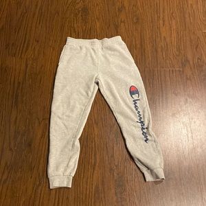 Champion grey sweatpants WITH pockets. Size L in kids.